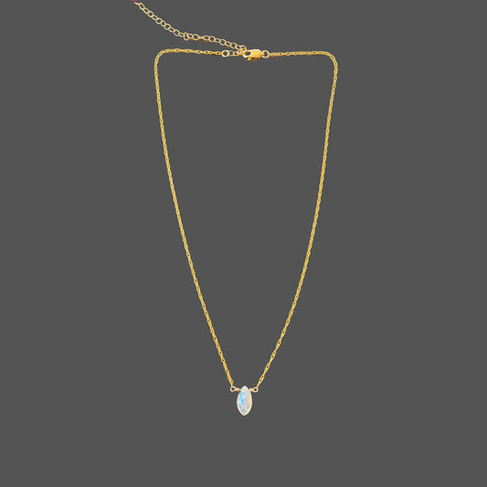 Gemstone pendant necklace with marquise shaped rainbow moonstone pendant centered on a delicate gold rope chain. Shown alone on plain background.